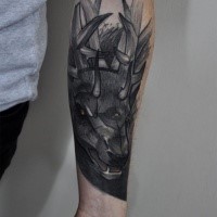 Engraving style colored forearm tattoo of demonic deer