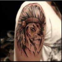 Engraving style colored shoulder tattoo Indian style lion