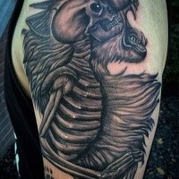 Engraving style colored shoulder tattoo of werewolf with human skeleton