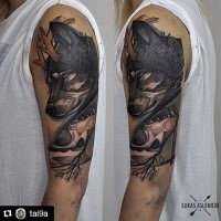 Engraving style colored shoulder tattoo of wolf with skull and horns