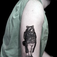 Engraving style colored shoulder tattoo of little raccoon gentleman