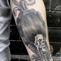 Engraving style nice looking forearm tattoo of medieval woman skeleton with big wig