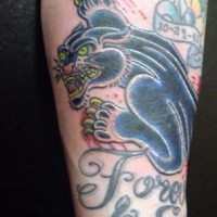 Evil black panther tattoo on arm