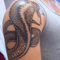 Excellent tattoo of a cobra snake