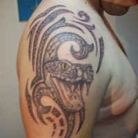 Tribal snake tattoo on half sleeve for men