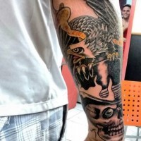 Fabulous designed colored eagle with gentleman skeleton tattoo on arm