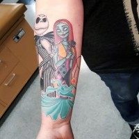 Fantastic colored detailed usual monster couple tattoo on forearm