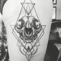 Fantastic dot style thigh tattoo of cat skull with various ornaments