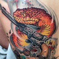 Fantastic illustrative style colored back tattoo of big snake with old revolver