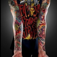 Fantastic multicolored various creatures and flowers tattoo on sleeve with lettering