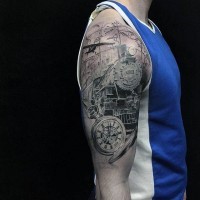 Fantastic very detailed black and white train shoulder area tattoo