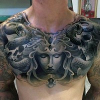 Fantasy like black and white Medusa with snakes tattoo on chest