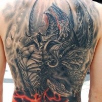 Fantasy style big impressive looking whole back tattoo of evil dragon