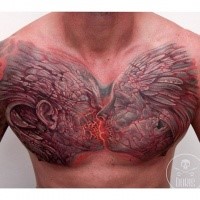 Fantasy style colored chest tattoo of kissing demons couple