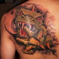 Fantasy style colored scapular tattoo of evil dragon