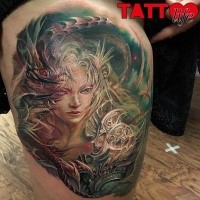Fantasy style colored thigh tattoo of woman warrior