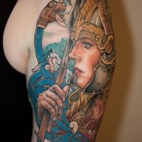 Fantasy style illustrative shoulder tattoo of woman with cool helemet