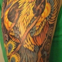 Fire Phoenix rising from ashes tattoo