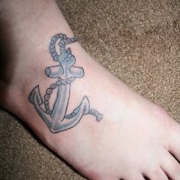 Flat anchor tattoo on foot