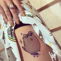 For girls style colored thigh tattoo of cartoon cat