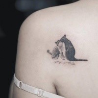 For girls style detailed scapular tattoo of cats couple with lettering