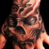 Monster skull tattoo on hand by hatefulss