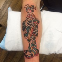 Funny Asian Geisha in kimono with hand fen colored forearm length tattoo in old school style