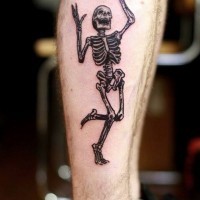 Funny black ink dancing skeleton tattoo on leg