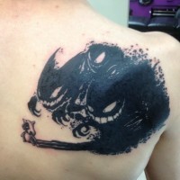 Funny cartoon like black ink on back tattoo of tiny cow with monster shadows