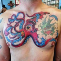 Funny cartoon like multicolored squid with bird and lettering tattoo on chest
