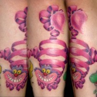 Funny cartoon style colored Alice in wonderland tattoo