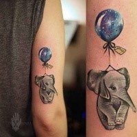 Funny colored arm tattoo of sad elephant and balloon