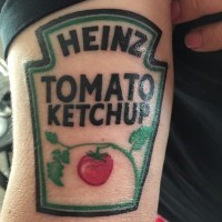 Funny colored Heinz ketchup label traditionally colored arm tattoo
