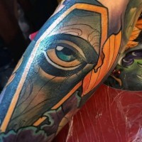 Funny colored little mystical coffin tattoo on arm