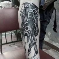 Funny designed and painted black ink alligator with skull and knifes tattoo on leg