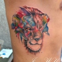 Funny looking abstract style colored side tattoo of lion head