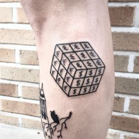 Funny looking black ink cube tattoo on leg stylized with various money symbols