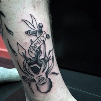 Funny nautical themed anchor with smiling octopus tattoo on ankle
