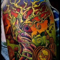 Funny painted Halloween themed big tattoo on shoulder stylize with big old lonely tree