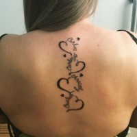 Funny romantic black ink hearts tattoo on upper back combined with lettering