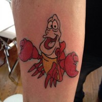 Funny Sebastian naturally colored Ariel cartoon hero tattoo on forearm