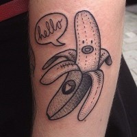 Funny smiling banana with banner lettering and tiny heart on sticker forearm tattoo