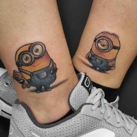 Funny traditionally colored cartoon heroes minions couple tattoo on ankles in 3D style