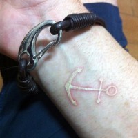 Funny white little cute anchor tattoo on wrist