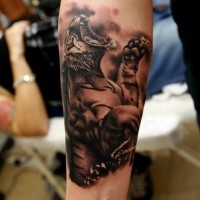 Furious roaring tiger forearm tattoo designed with shadows