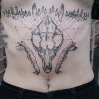 Geometrical style black ink belly tattoo of animal skull with geometrical figures
