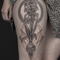 Geometrical style black ink flower on thigh
