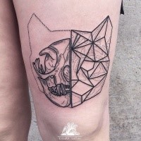 Geometrical style black ink thigh tattoo of cat head
