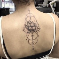 Geometrical style black ink upper back tattoo of geometrical figure and cute flower