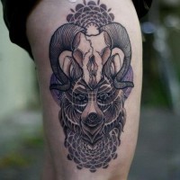 Geometrical style colored big animal skull tattoo on thigh